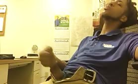 Young black rubbing his cock at work