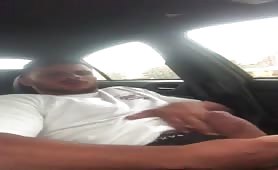 Cute muscled latino wanking his cock in the car