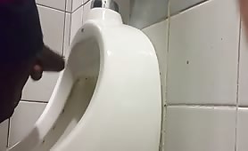 Caught a huge str8 dominican cock jerking off in a public toilet