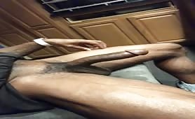 Sexy muscular basketball player stroking his cock in the kitchen