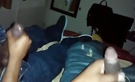 Two str8  friends jerking off while watching porn