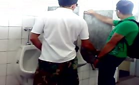 Caught a guy masturbating a straight dude in a public toilet