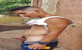 Cute young straight latino rubbing his cock by the river