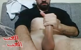handsome arab guy wanks his huge cock