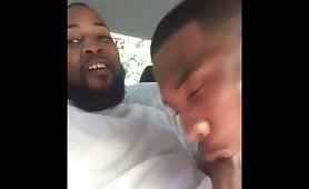 Big straight black bear getting a blow by his gay friend in the car